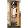 A tall, narrow wooden cabinet with its doors open, revealing clothing and accessories inside. Produktbild-Vorschau