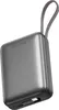 A gray external battery pack with a gray strap attached. Produktbild-Vorschau