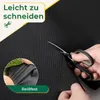 A close-up of black fabric being cut by scissors, with inset images showing the fabric's texture and a hand stretching it. Produktbild-Vorschau