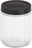 A clear studio shot of a glass jar with a black lid. Náhled obrázku produktu