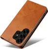 A brown leather flip case for a smartphone is shown from a diagonal angle. Produktbild-Vorschau