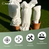 Three potted plants are covered with white protective fleece, with icons and text below indicating product features. Produktbild-Vorschau