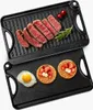 Two cast iron grill pans are shown, one with sliced steak and garnishes, the other with waffles and a fried egg. Náhľad obrázku produktu