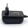 A black power adapter with European-style plug pins is shown against a white background. Produktbild-Vorschau