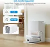 A white robot vacuum docking station with a dustbin is shown next to a wall. Informational graphics about capacity and duration are displayed on the left. Produktbild-Vorschau