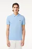 Polo azzurro Lacoste Classic Fit Anteprima dell’immagine prodotto 15