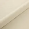 A rolled-up piece of beige fabric, likely upholstery or bedding material. Náhled obrázku produktu