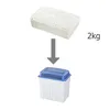 An illustration showing a 2kg block of white absorbent material being placed into a blue and white dehumidifier container. Anteprima dell’immagine prodotto
