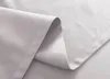 A close-up view of folded gray fabric, likely a curtain or textile. Produktbild-Vorschau
