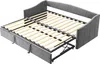 A grey upholstered daybed with its pull-out trundle bed extended, showing the wooden slat support system for both beds. Produktbild-Vorschau