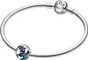 A silver Pandora bracelet with a clip charm shaped like a blue and white globe. Podgląd zdjęcia produktu