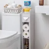 A bathroom scene showing a toilet and a narrow storage unit next to it. Náhled obrázku produktu