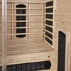 Interior view of a wooden sauna cabin, showing benches and heating elements. Produktbild-Vorschau