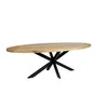 A wooden oval dining table with a black starburst base, isolated on a white background. Voir les images du produit