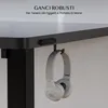 A close-up shot of a desk with a headphone hook and headphones attached. Anteprima dell’immagine prodotto