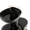 A close-up view of a black juicer attachment with measurement indicators. Náhled obrázku produktu