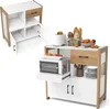 A kitchen cabinet with a microwave, toaster, bread, and fruit. Podgląd zdjęcia produktu