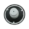 A top-down view of a black diesel tank cap with a white central component and a white seal. Anteprima dell’immagine prodotto