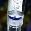 Close-up of a solar light with water bubbles and a blue light. Produktbild-Vorschau