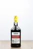 A bottle of Sandeman Fine Ruby Port wine is displayed on a wooden surface against a white background. Produktbild-Vorschau