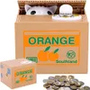 A product shot of a coin bank shaped like a box with a cat peeking out, along with a smaller version of the product and a pile of coins. Náhľad obrázku produktu