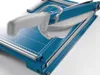 A close-up, angled view of a blue paper guillotine on a white background. Anteprima dell’immagine prodotto