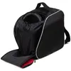 A black ski boot bag with white trim, shown open with a helmet inside. Produktbild-Vorschau