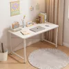 A white desk with a laptop, books, and decorative items in a room with curtains and a rug. Anteprima dell’immagine prodotto