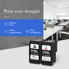 A marketing image showing two ink cartridges in the foreground and a modern office space in the background. Produktbild-Vorschau