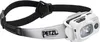 A white and gray Petzl headlamp with a black adjustable strap. Anteprima dell’immagine prodotto