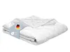 A folded white duvet is presented on a white background with a product tag attached. Anteprima dell’immagine prodotto