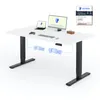A white adjustable desk with black legs, equipped with a laptop, monitor, keyboard, mouse, and game controller. The desk's internal mechanism is illustrated with wireframe diagrams. Náhled obrázku produktu