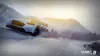 A rally car driving through a snowy landscape with dust and snow kicking up. Produktbild-Vorschau