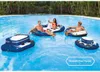 People relaxing on inflatable floats in a swimming pool. Produktbild-Vorschau