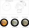Diagrams showing how to charge and operate a moon lamp, with illustrations of different light settings. Produktbild-Vorschau