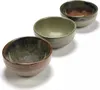 Three ceramic bowls are arranged diagonally on a white background. Voir les images du produit