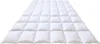 A white quilted duvet is laid out flat on a white background. Produktbild-Vorschau