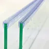 Close-up view of two shower door seals attached to glass panels. Anteprima dell’immagine prodotto