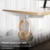 A pair of headphones hanging from a desk hook, with text overlay describing the product. Anteprima dell’immagine prodotto