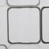 A close-up view of a white shower curtain with a repeating pattern of rounded squares outlined in gray. Podgląd zdjęcia produktu