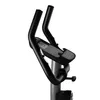 A close-up view of the handlebars and console of an exercise bike. Produktbild-Vorschau