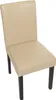 A single dining chair with a cream-colored seat and backrest, and dark brown legs, is shown against a white background. Podgląd zdjęcia produktu