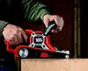A person using a Black & Decker belt sander on a piece of wood. Anteprima dell’immagine prodotto