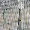 A close-up view of a greenhouse cover with a zipper. Produktbild-Vorschau