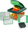 A set of vegetable choppers and accessories, with chopped vegetables in the main container. Voir les images du produit