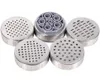 A set of stainless steel pasta maker dies with a central gray plastic component. Produktbild-Vorschau
