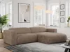 A modern living room with a large sectional sofa.