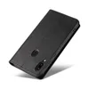 A black leather flip phone case is shown at an angle against a white background. Produktbild-Vorschau