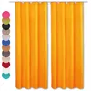 A pair of orange curtains is displayed against a white background, with a color swatch palette on the left. Produktbild-Vorschau