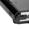 A close-up view of the corner of a black electronic device with silver accents. Voir les images du produit